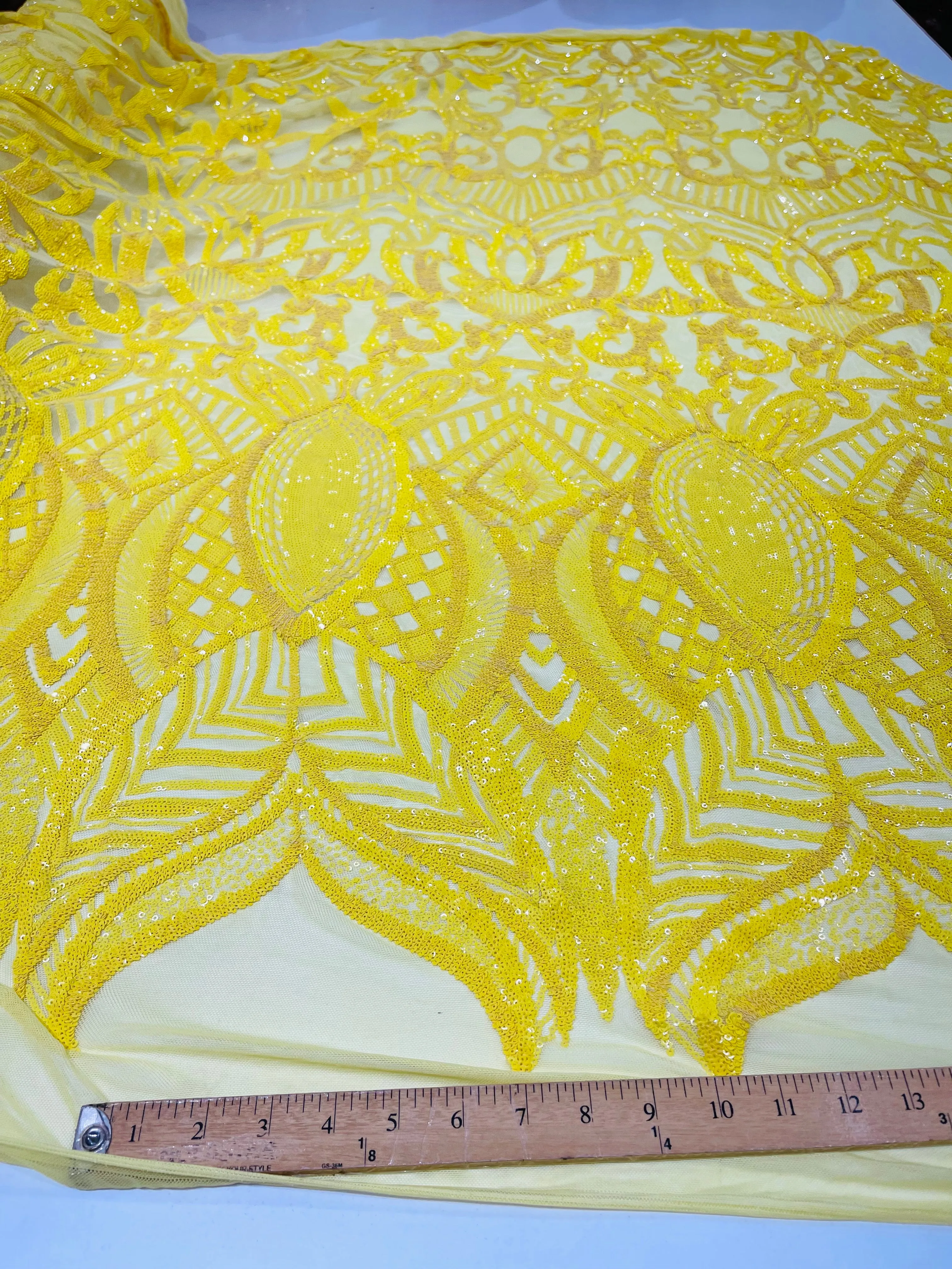 Bright Yellow royalty design on a 4 way stretch mesh-prom-sold by the yard.