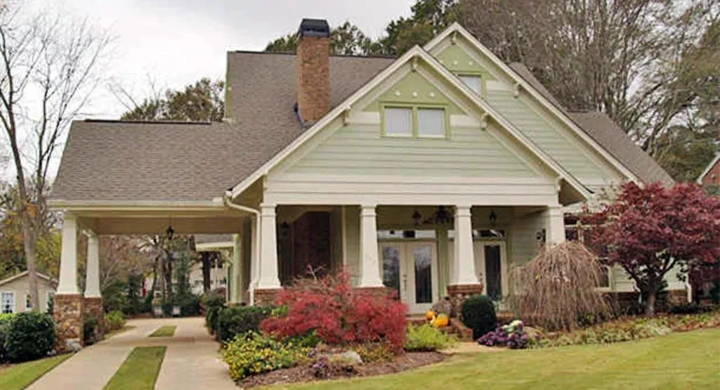 Charming 3-Bedroom Home Plan with Front Garage and Spacious Design