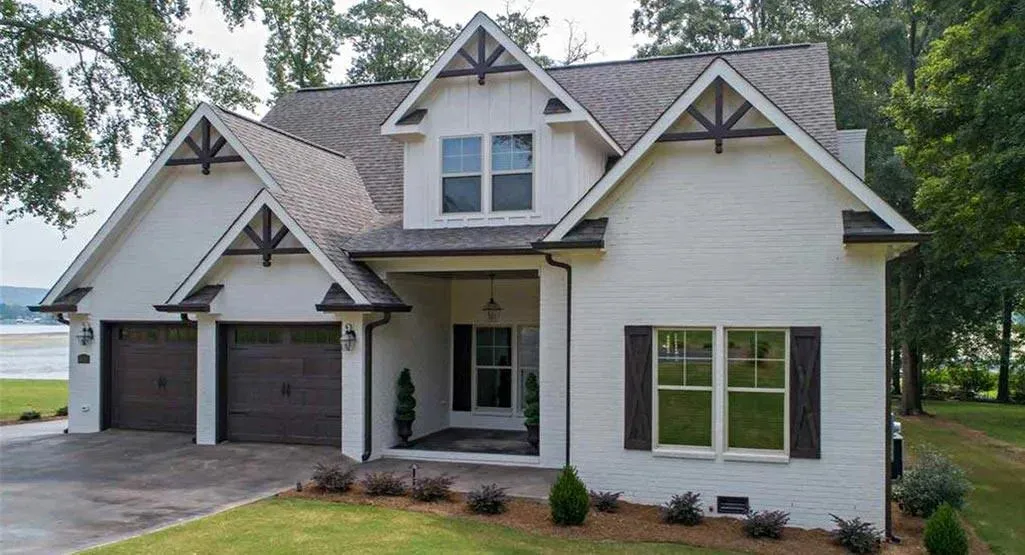 Spacious Family Home with Inviting Porches and Ample Garage Space